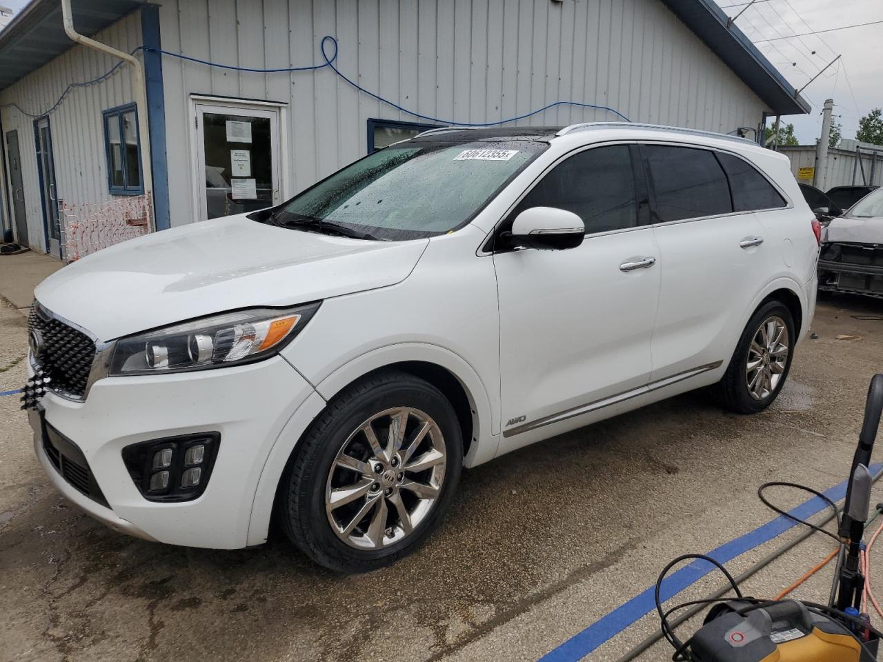KIA SORENTO SX  *5XYPKDA5XGG093981*