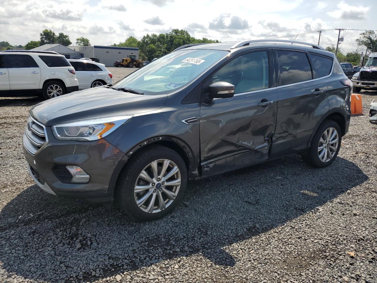 FORD ESCAPE TIT  *1FMCU0J9XHUA68191*