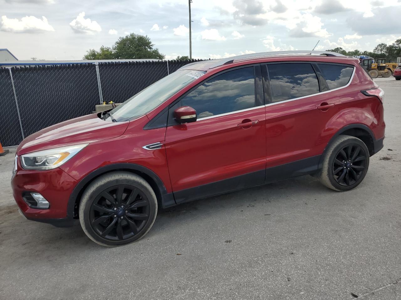 FORD ESCAPE TIT  *1FMCU9J95HUB54173*