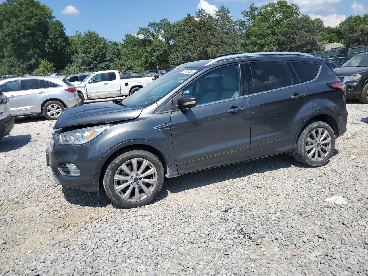 FORD ESCAPE TIT  *1FMCU9J98HUC30291*