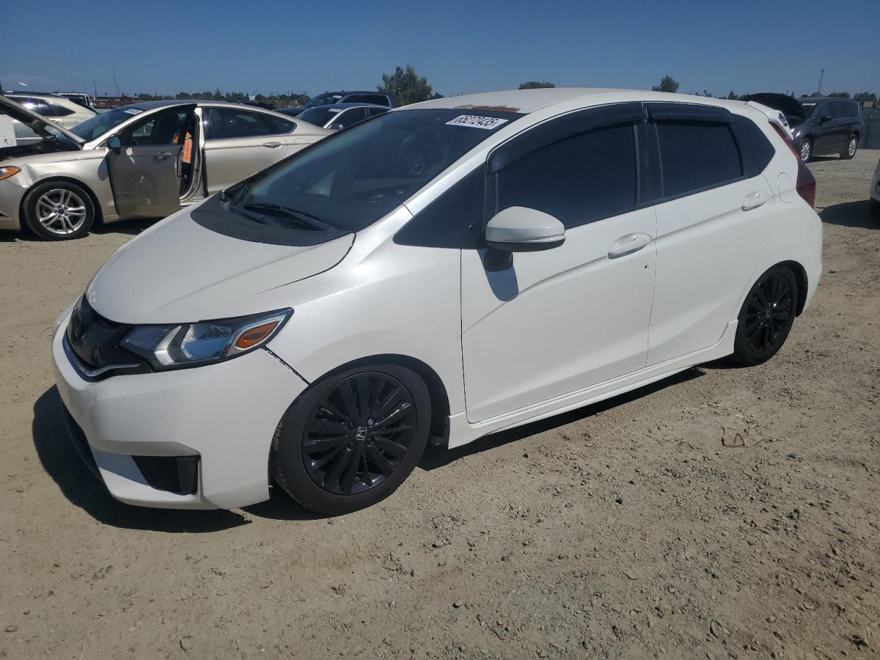 HONDA FIT LX  *3HGGK5G59FM738930*