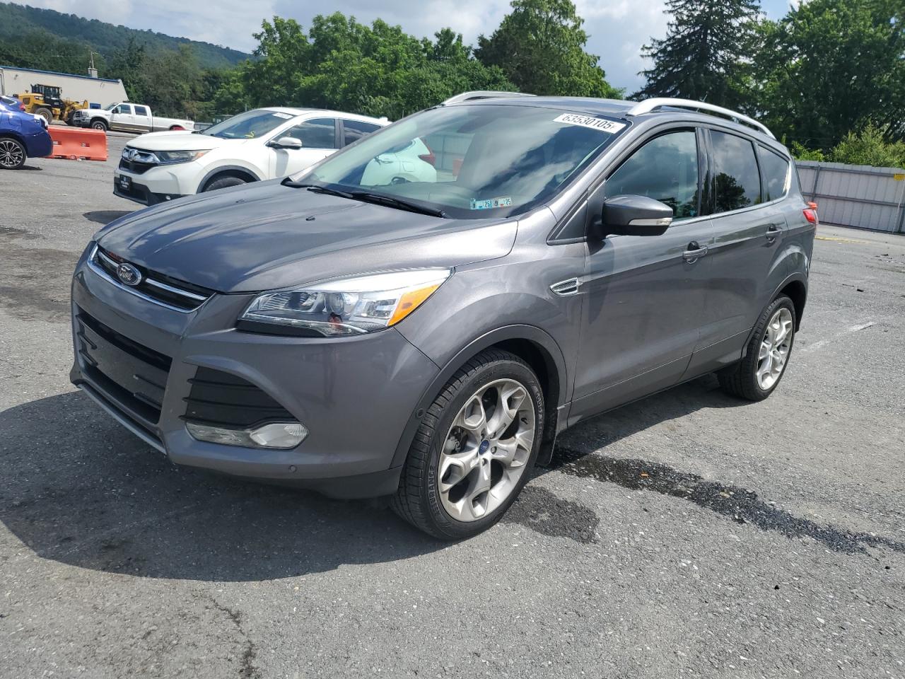 FORD ESCAPE TIT  *1FMCU9J91EUA57435*