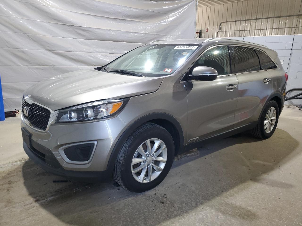 KIA SORENTO LX  *5XYPGDA5XGG172116*